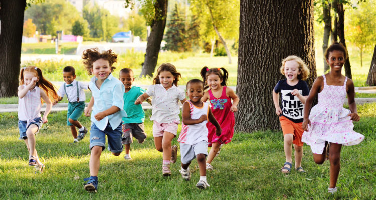 kids, running, outside, on, grass, with, trees, in, background
