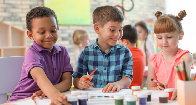 children, at, daycare, doing, crafts, on, a, table