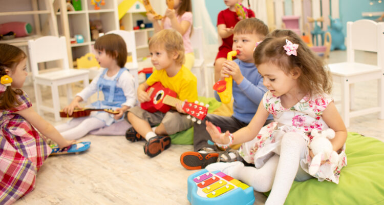 kids, playing, with, instruments, at, daycare