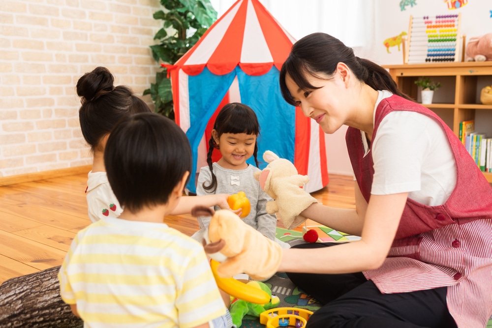 daycare, staff, playing, with, and, watching, children